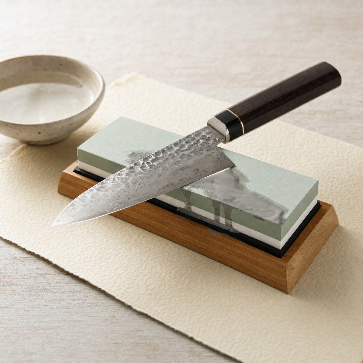 A knife set down mid sharpening on the stone
